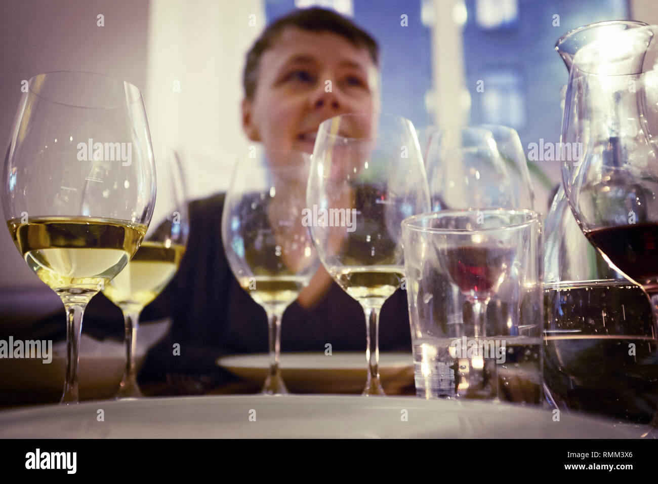 Woman glass wine in restaurant hi-res stock photography and images - Alamy