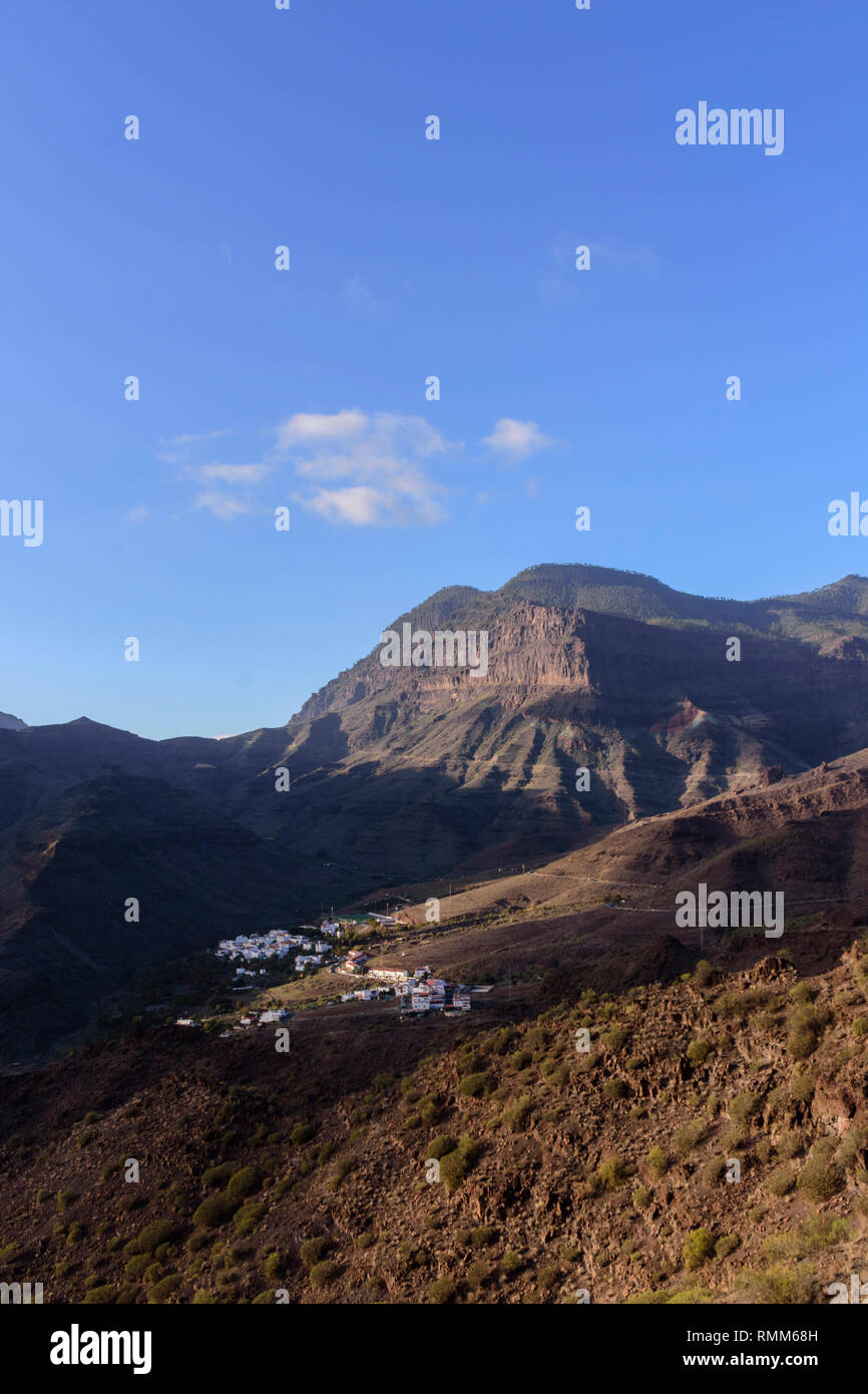 Scene view of village in the valley Stock Photo - Alamy