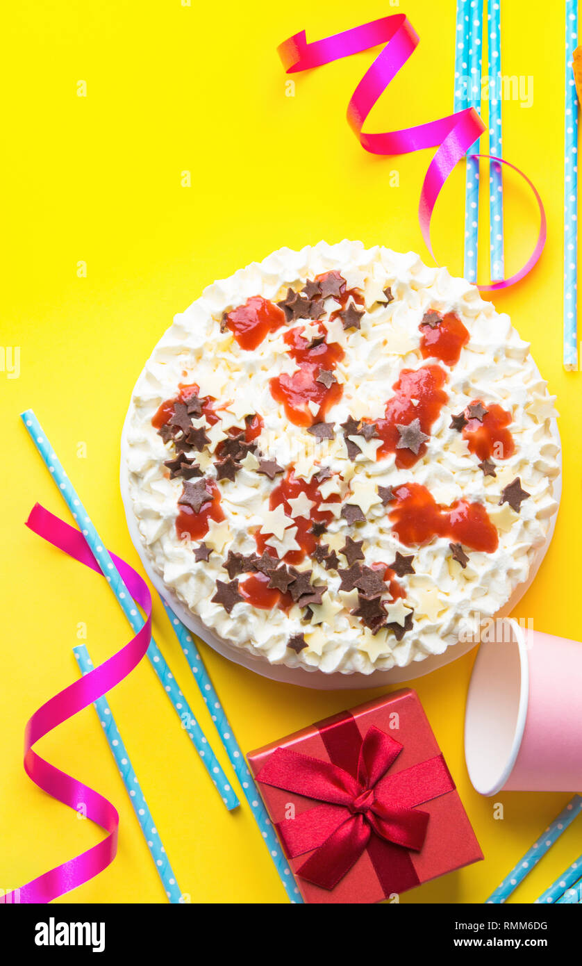 Sponge layer birthday cake with whipped cream frosting milk chocolate