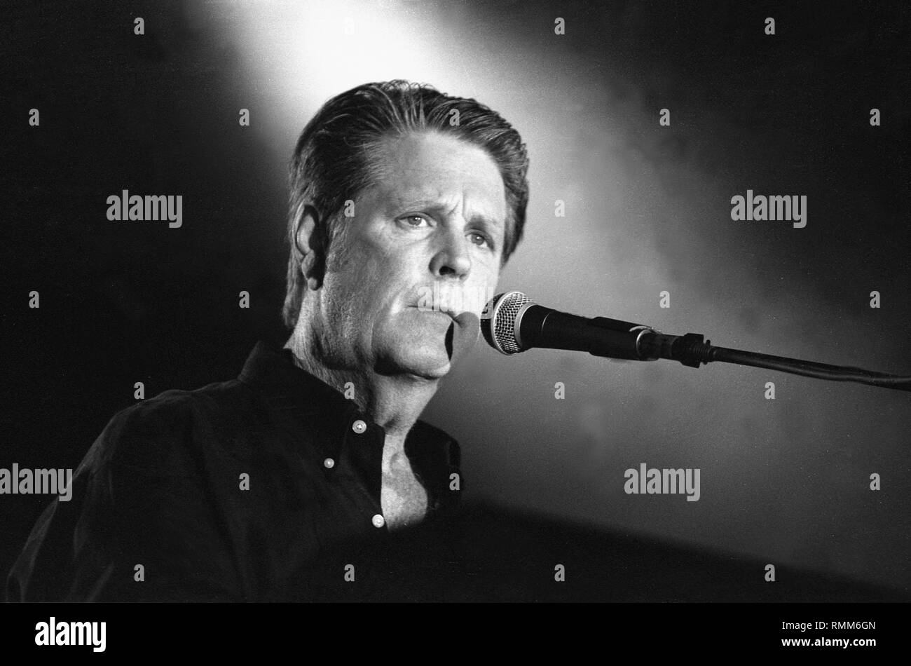 Grammy Award winning musician Brian Wilson, best known as the leader and chief songwriter of the Beach Boys, is shown performing on stage during a 'live' concert appearance. Stock Photo