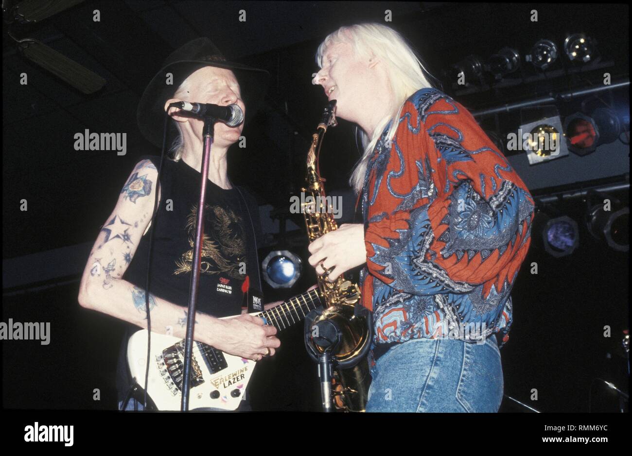 Brothers Johnny and Edgar WInter are shown performing on stage during a 'live' concert appearance. Stock Photo