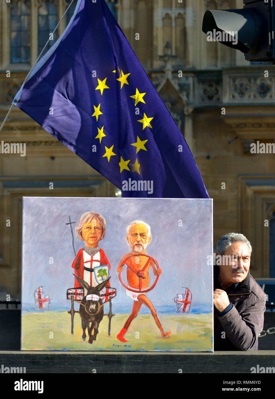Kaya Mar - Turkish political cartoonist - with his new Brexit painting of PM Theresa May and Jeremy Corbyn. 14th Feb 2019 Stock Photo
