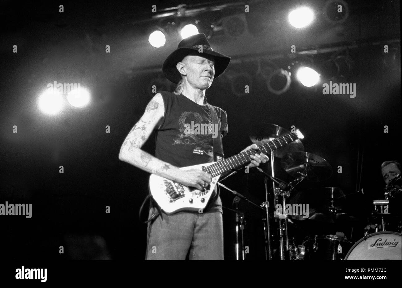 Blues guitarist, singer and producer Johnny Winter III is shown performing on stage during a 'live' concert appearance. Stock Photo