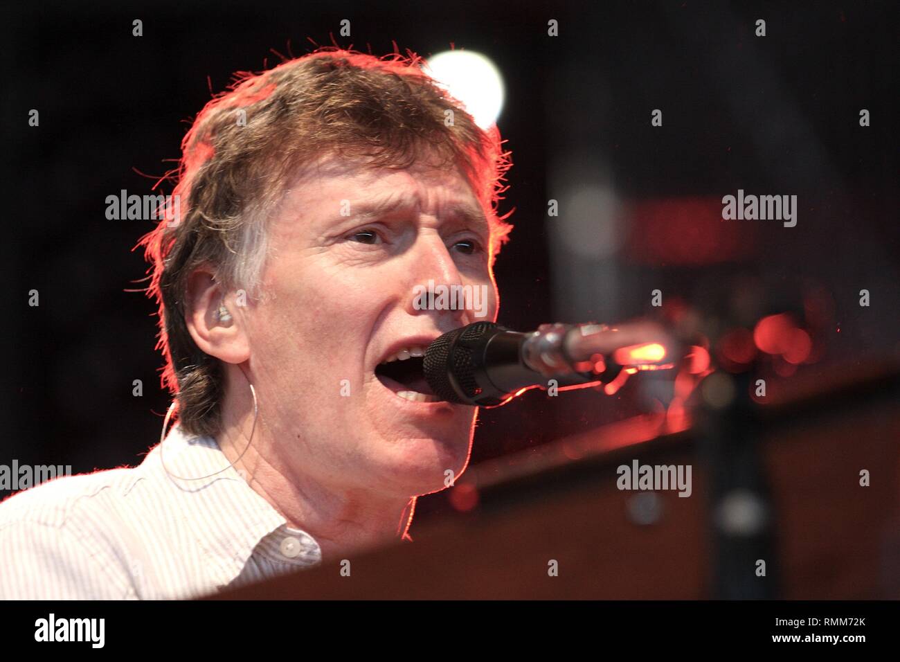 Singer, songwriter and multi-instrumentalist Steve Winwood, formerly of the the Spencer Davis Group, Traffic and Blind Faith, is shown performing on stage during 'live' concert appearance. Stock Photo