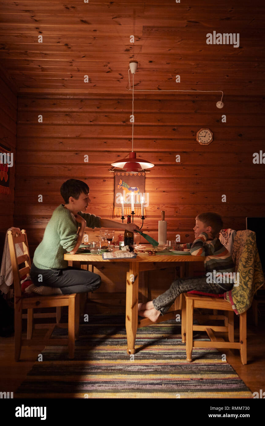 Mother with son having meal Stock Photo