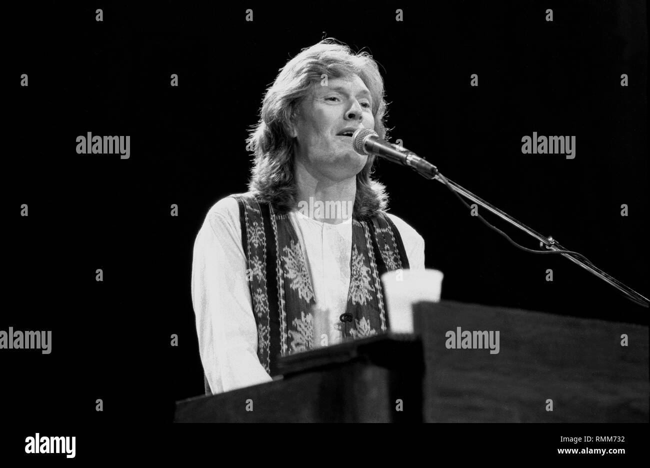 Singer, songwriter and multi-instrumentalist Steve Winwood, formerly of the the Spencer Davis Group, Traffic and Blind Faith, is shown performing on stage during 'live' concert appearance. Stock Photo