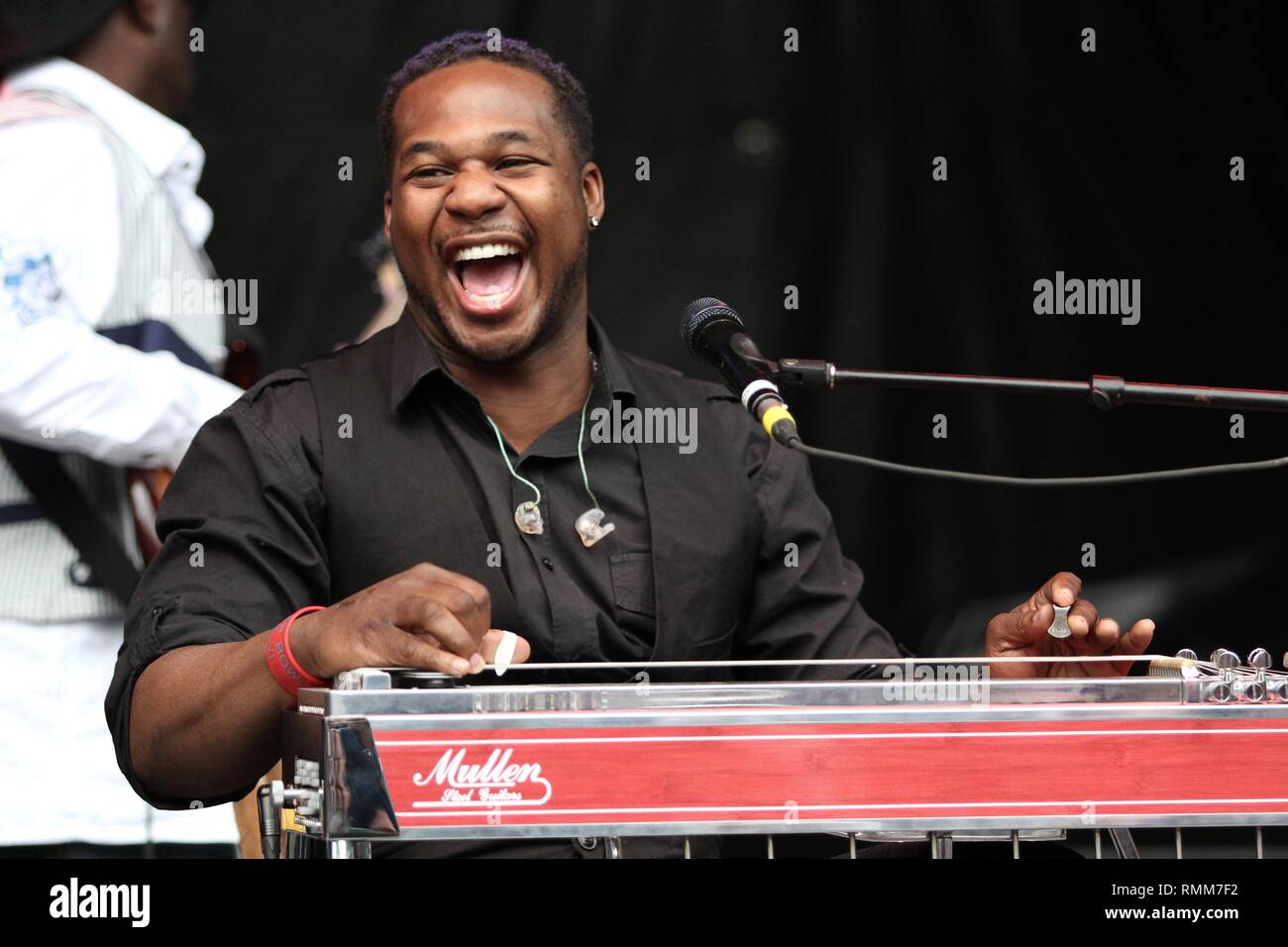 Musician Robert Randolph is shown performing on stage during a 