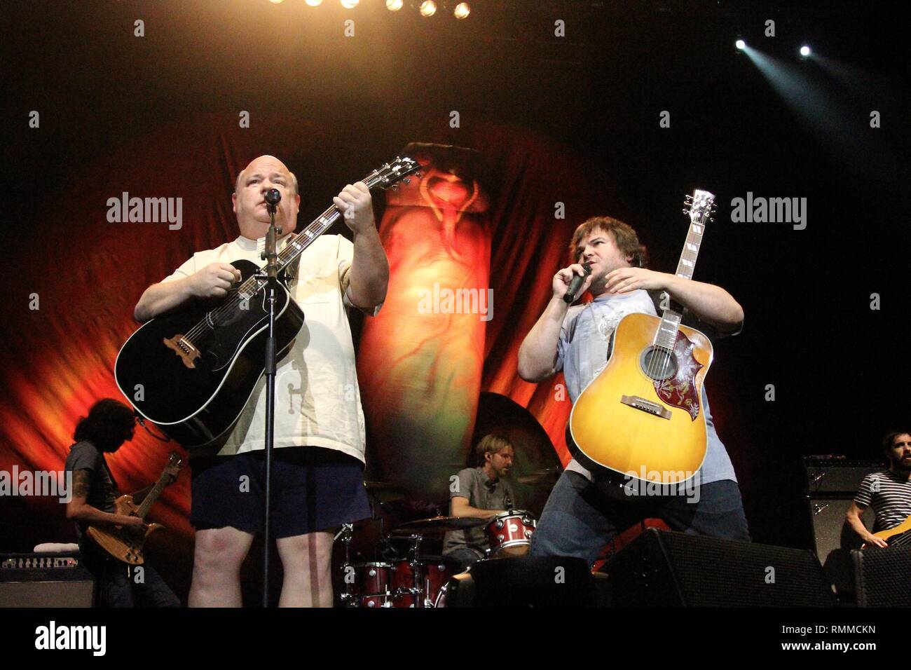 Musicians Kyle Gas and Jack Black are shown performing on stage during a 'live' concert appearance with Tenacious D. Stock Photo