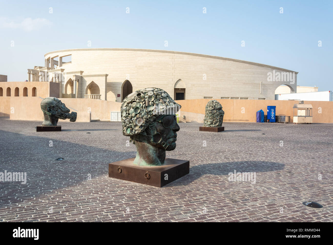 Doha, Qatar - November 7, 2016. Exterior view of amphitheater in Katara cultural village in Doha, Qatar, with modern sculptures. Stock Photo