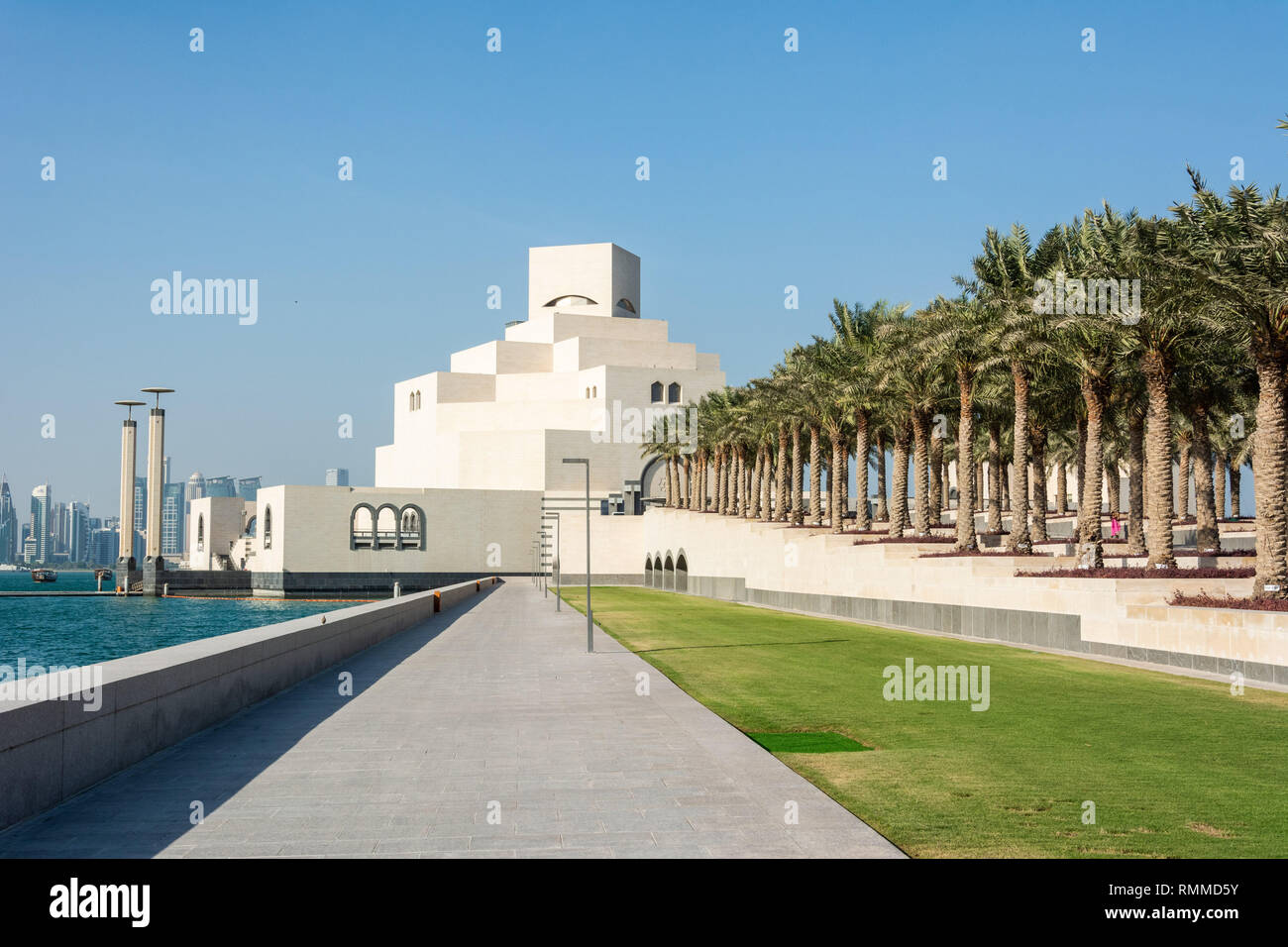Doha, Qatar - November 9, 2016. Exterior view of the Museum of Islamic Art in Doha, with palm trees. Stock Photo