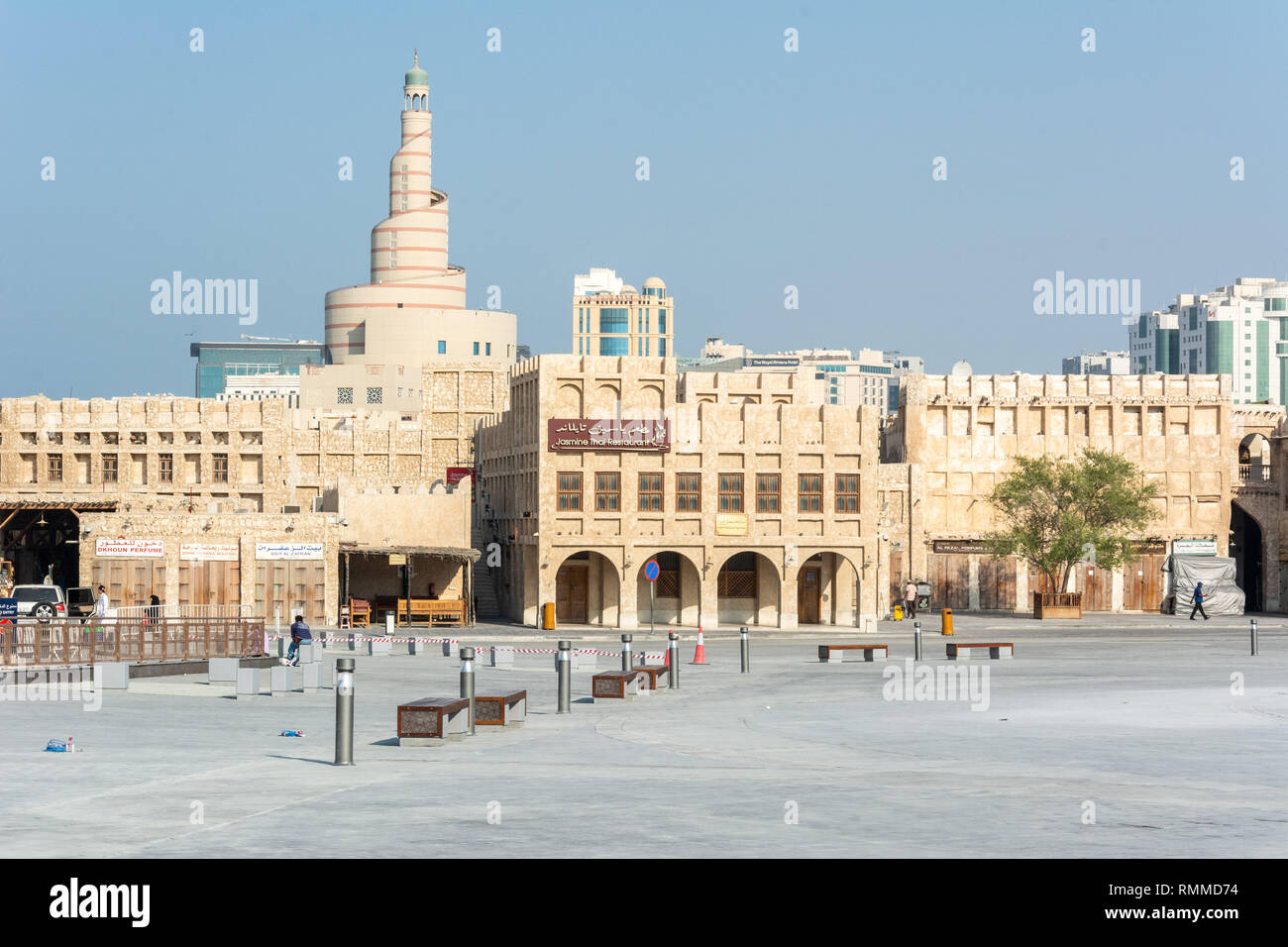 Doha, Qatar - November 3, 2016. View of public square in Doha with Bin Zaid Al Mahmoud Islamic Cultural Center (Fanar), modern residential and commerc Stock Photo