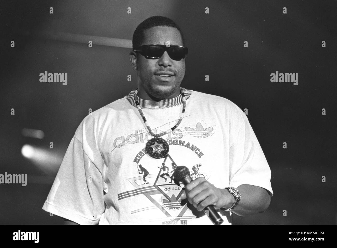 Grammy nominated rapper and actor Anthony Terrell Smith, stage name Tone Lōc is shown performing on stage during a 'live' concert appearance. Stock Photo