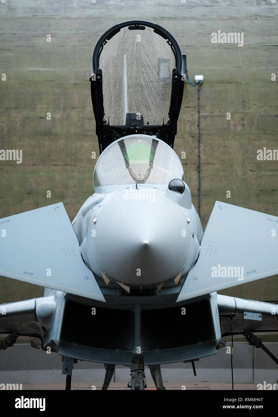 The front of an RAF Tornado jet fighter, with it's cockpit open, on the ...