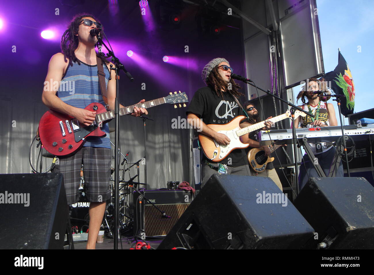 The Tribal Seeds are shown performing on stage during a "live" concert