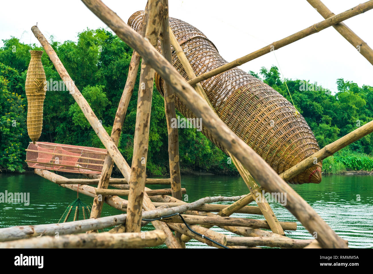 Ancient bamboo fish trap equipment of countryside, Thailand Stock Photo