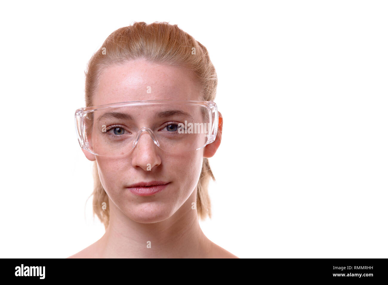 Front view closeup portrait of a beautiful young woman wearing safety