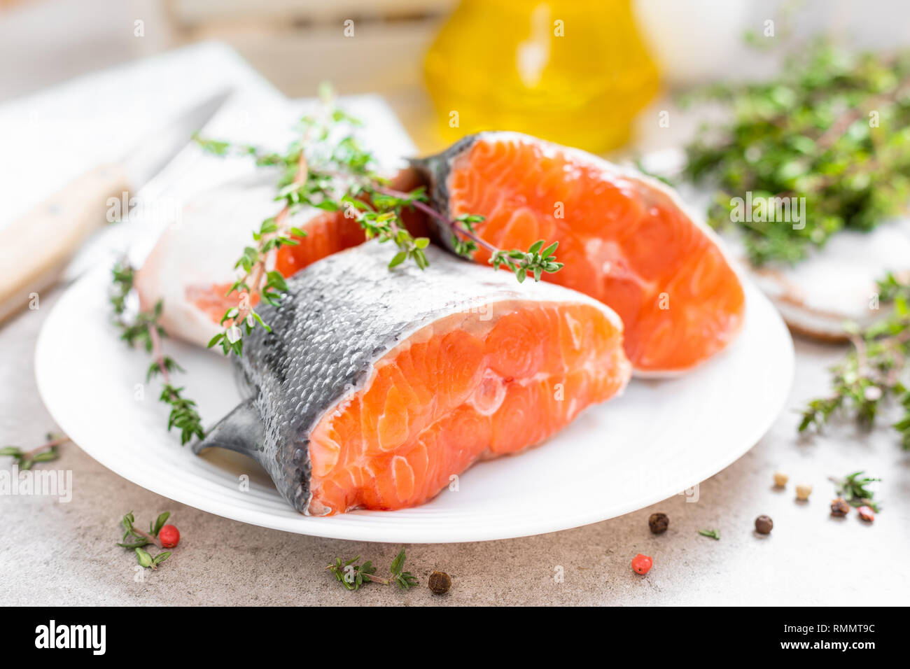 Fresh raw salmon fish steaks on white kitchen background Stock Photo ...