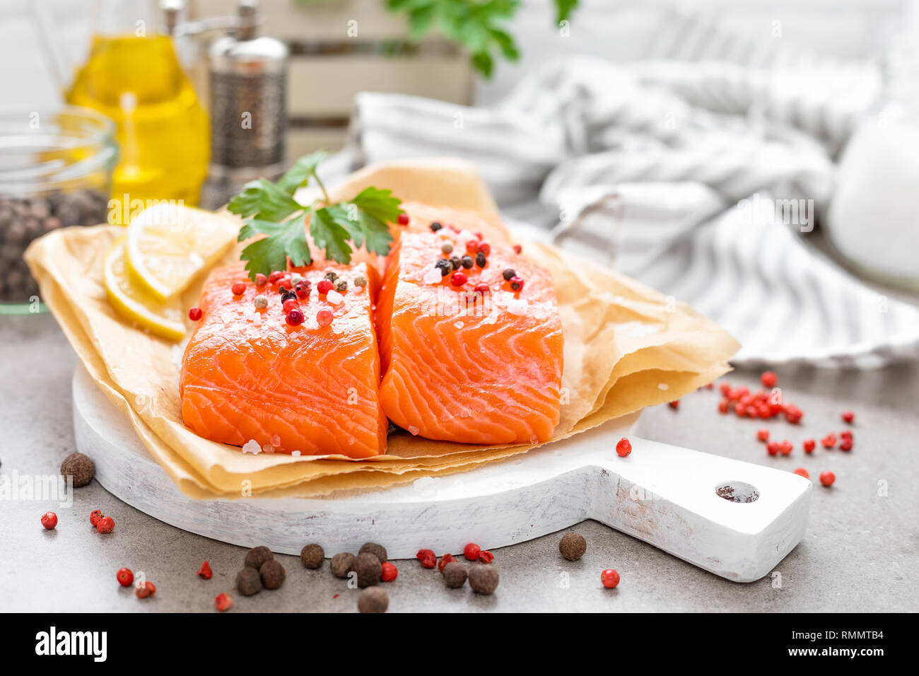 Fresh raw salmon fish fillet on white kitchen background Stock Photo ...