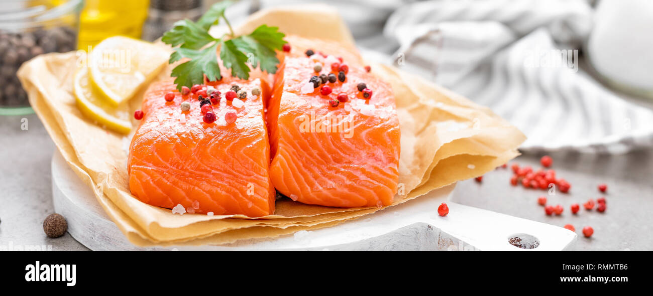 Fresh raw salmon fish fillet on white kitchen background Stock Photo ...