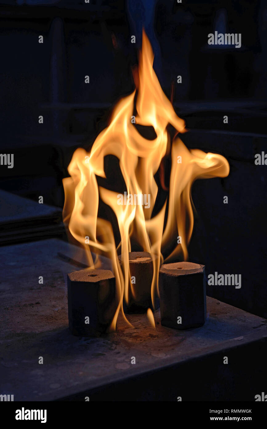 Flames help to bake an interior moulding for a cast iron gear. The mould need to withstnad temperatures of up to 1500 degrees celsius. Stock Photo