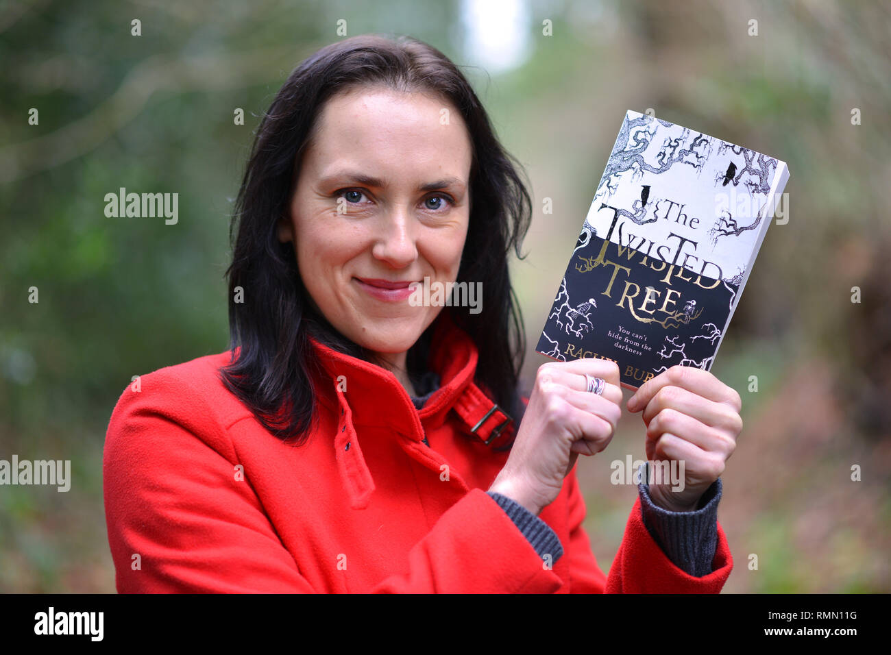 Author Rachel Burge withe her debut book The Twisted Tree, near her home in rural East Susserx