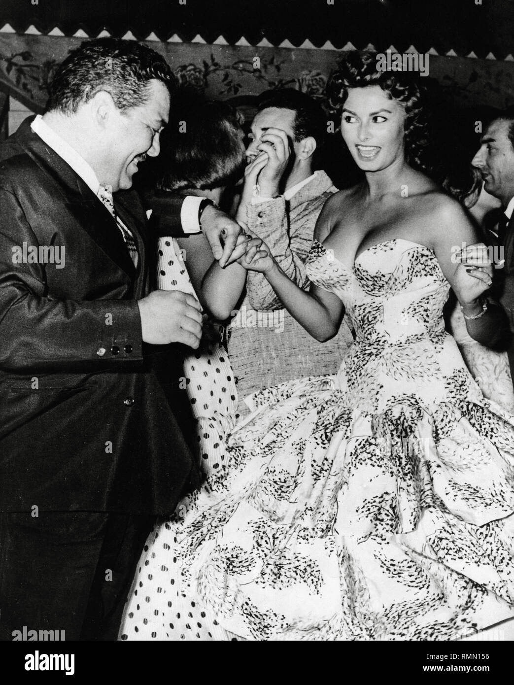 Sophia Loren and Folco Lulli at the 'Miss Cinema Rome 1955' contest, circa (1955)  File Reference # 33751 357THA Stock Photo