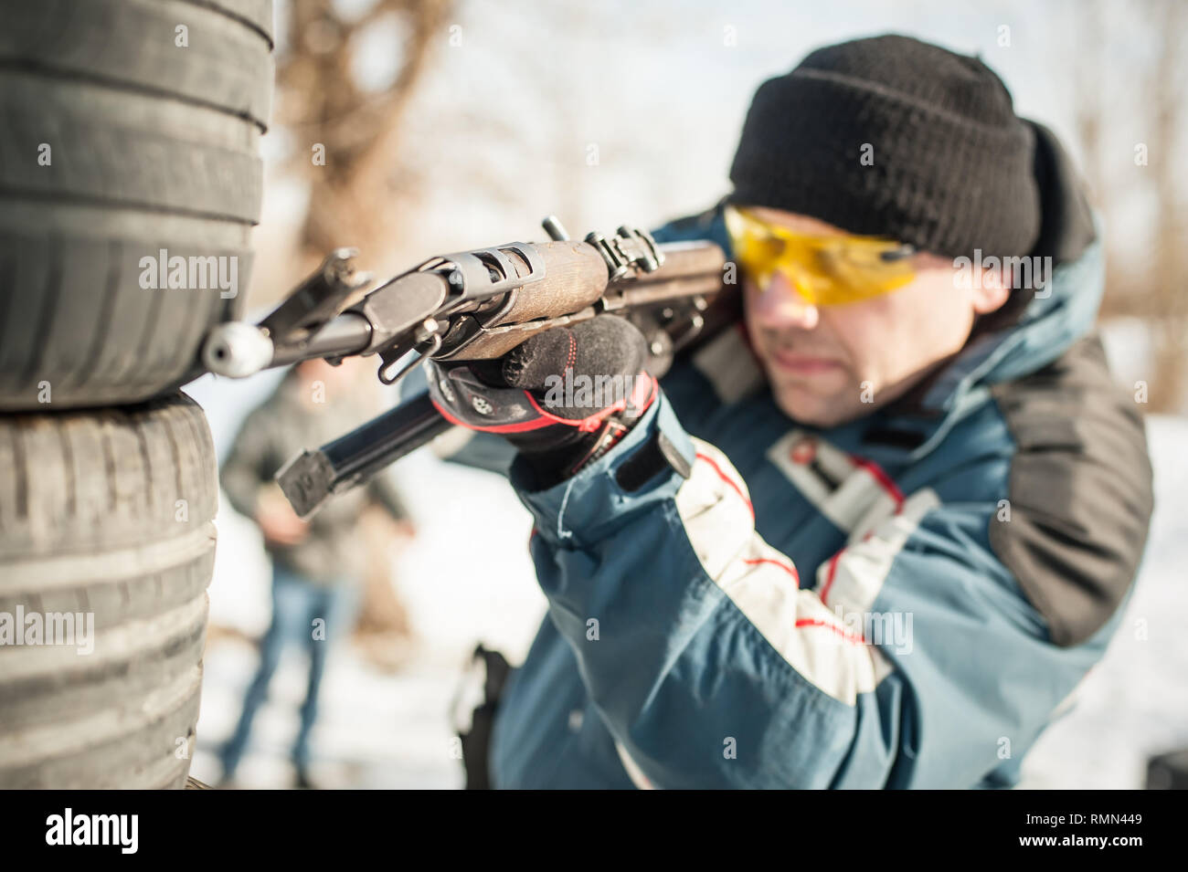 Rifle combat shooting training from behind and around cover or