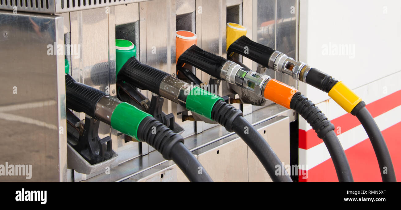 Close up of gas pump nozzles Stock Photo