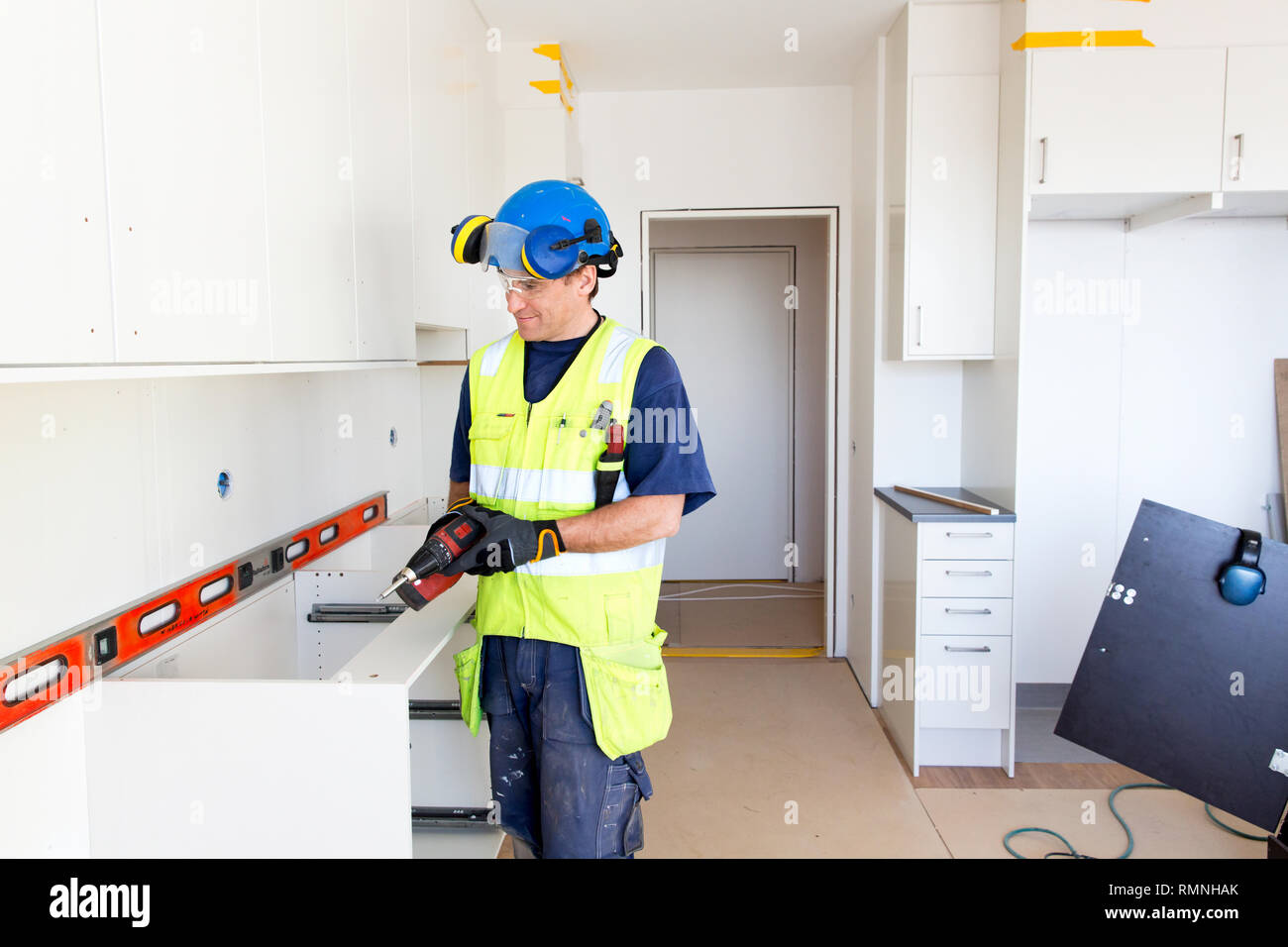Builder at work Stock Photo - Alamy