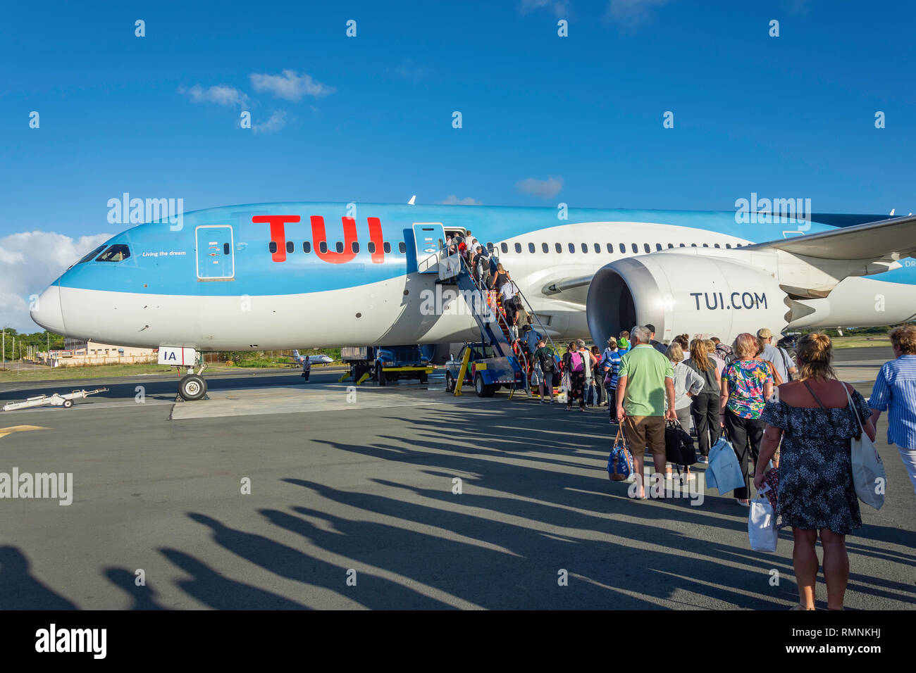 Passengers boarding TUI Boeing 787 Dreamliner at Hewanorra International Airport, Vieux Fort, Saint Lucia, Lesser Antilles, Caribbean Stock Photo