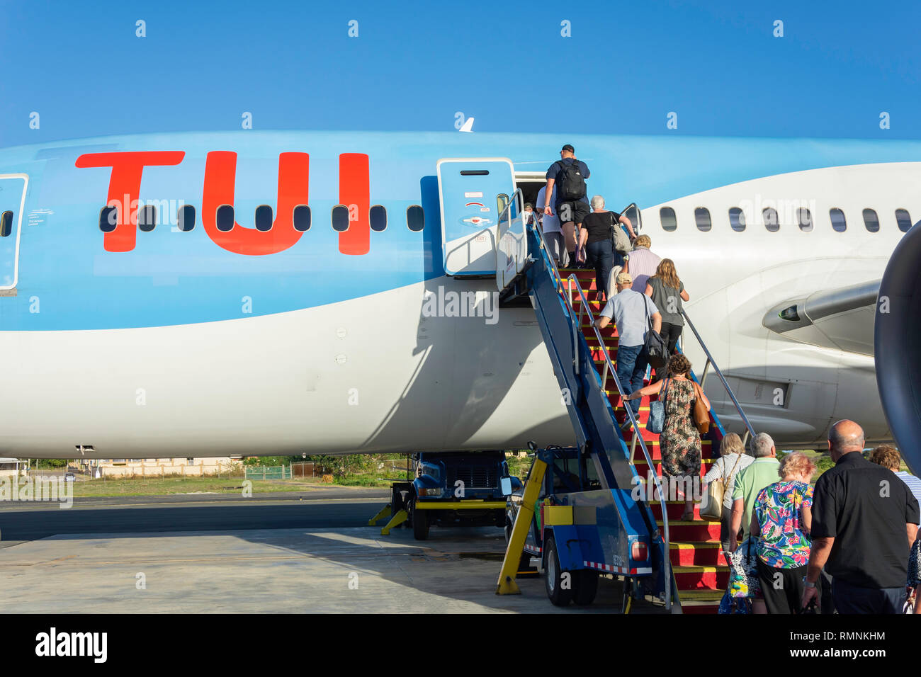 Passengers boarding TUI Boeing 787 Dreamliner at Hewanorra International Airport, Vieux Fort, Saint Lucia, Lesser Antilles, Caribbean Stock Photo