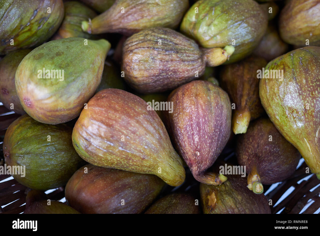 Ripe figs in a basket Stock Photo