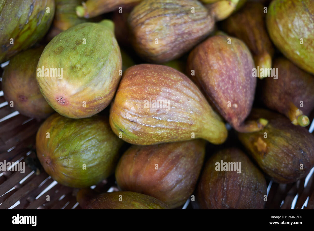 Ripe figs in a basket Stock Photo