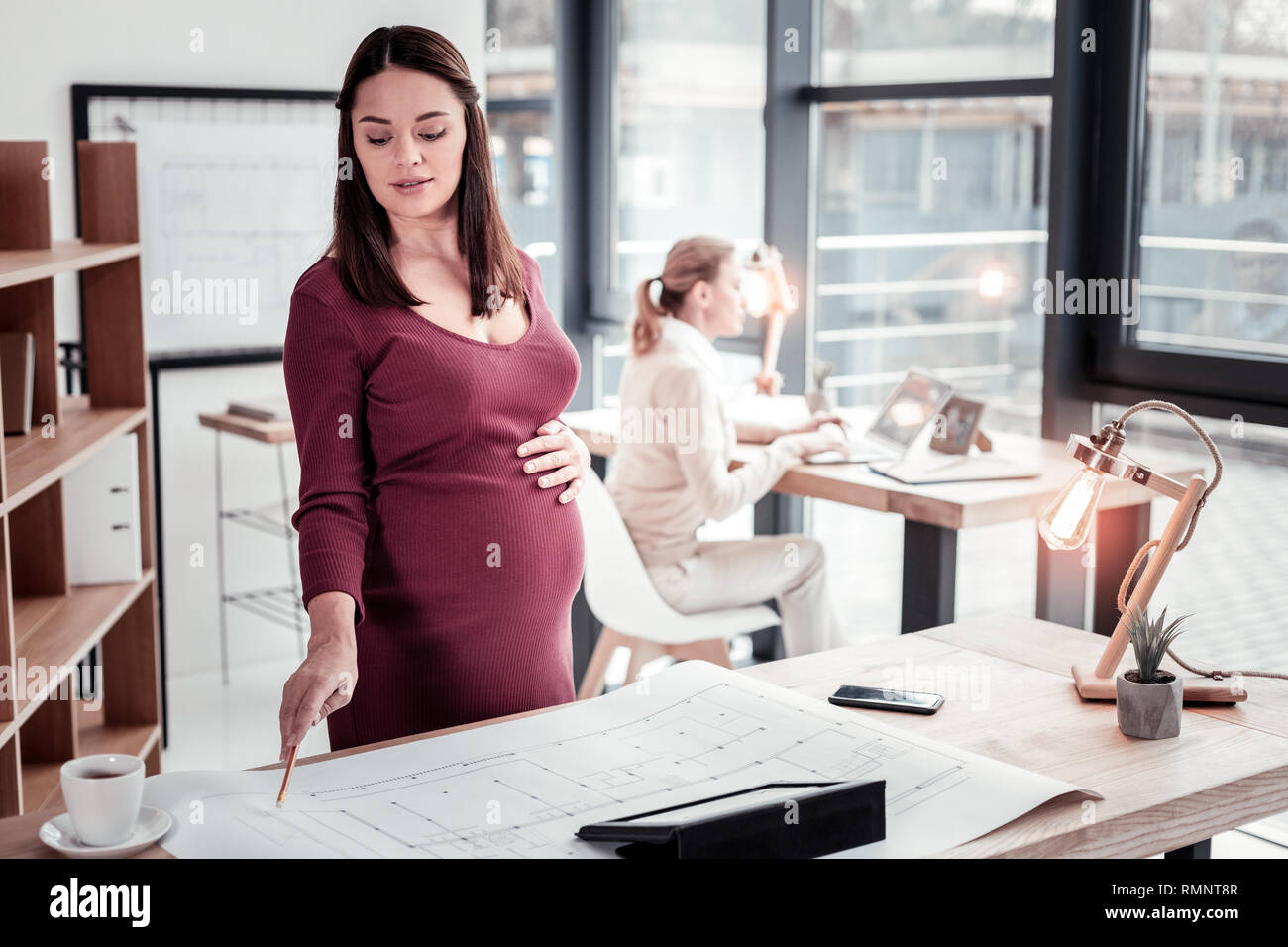 Maternity Teamwork Examples Team work. Pregnant woman feeling involved while joining her ...