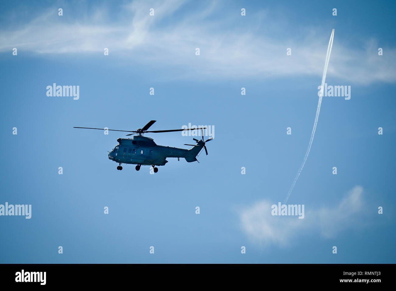 Helicopter Spanish Army flying in blue sky Stock Photo Alamy