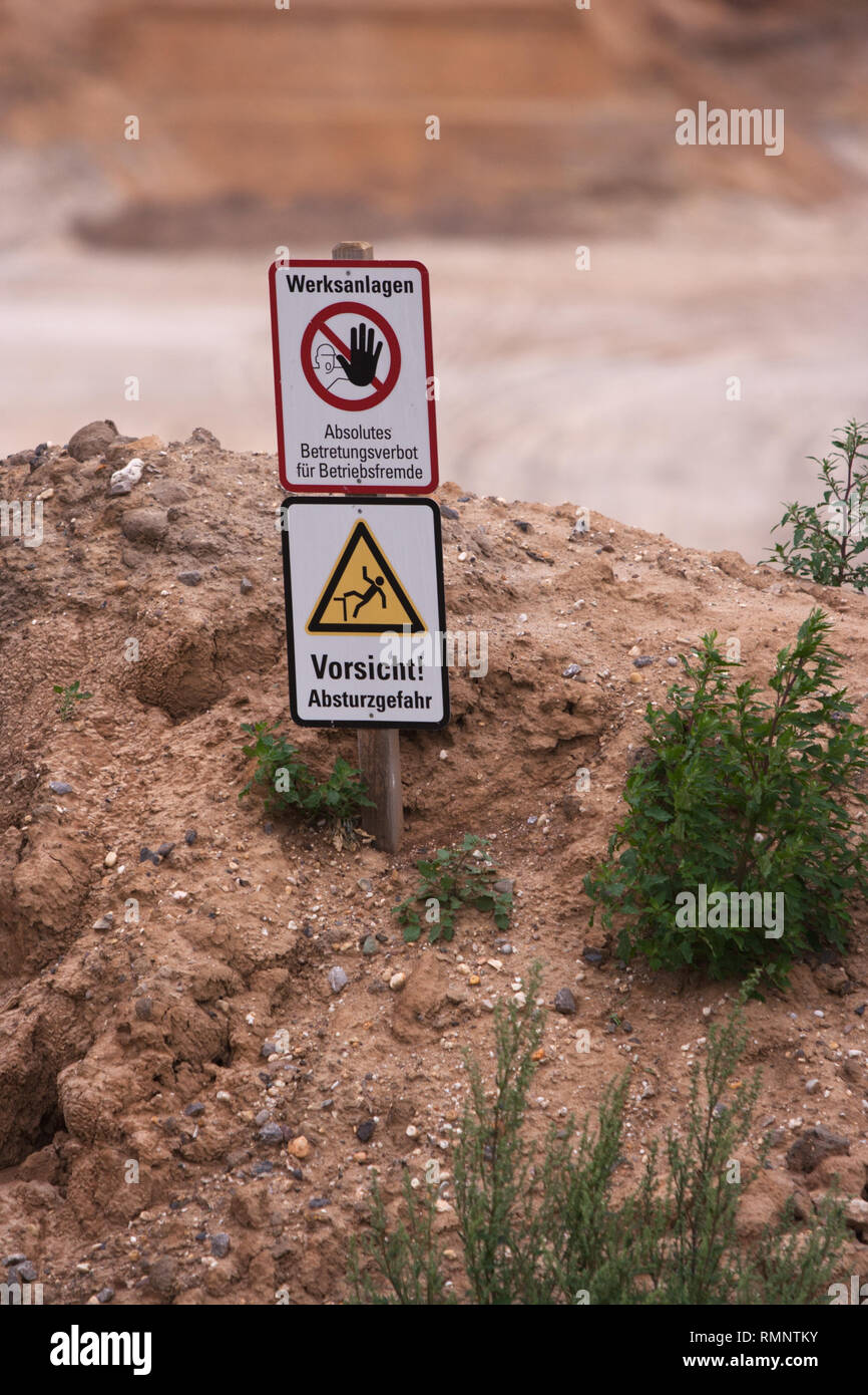 Warning signs at edge of RWE mining at Garzweiler Stock Photo