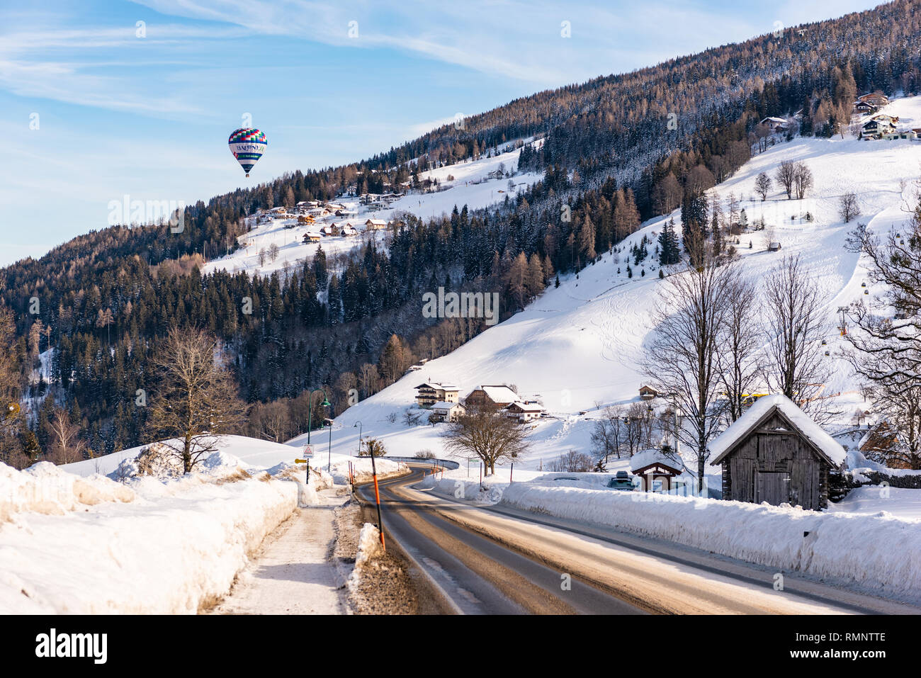 Empty road in winter Rohrmoos-Untertal, Schladming, Schladming-Dachstein, Dachstein massif, Liezen District, Styria, Austria, Europe Stock Photo