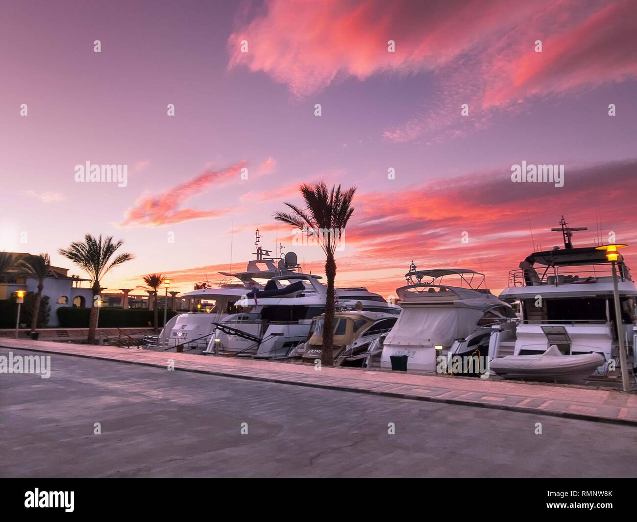 Luxury yachts moored in Abu Tig Marina in El Gouna, Egypt at sunset Stock Photo