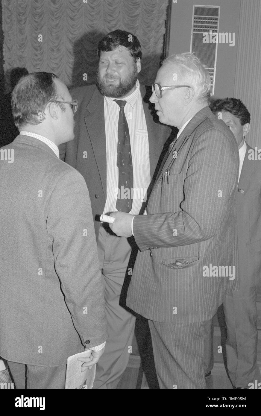 Moscow, USSR - August 23, 1991: Evgeniy Vladimirovich Kogan in the center and Roy Aleksandrovich Medvedev on the right at extraordinary session of Supreme Soviet of people's deputies of the USSR Stock Photo