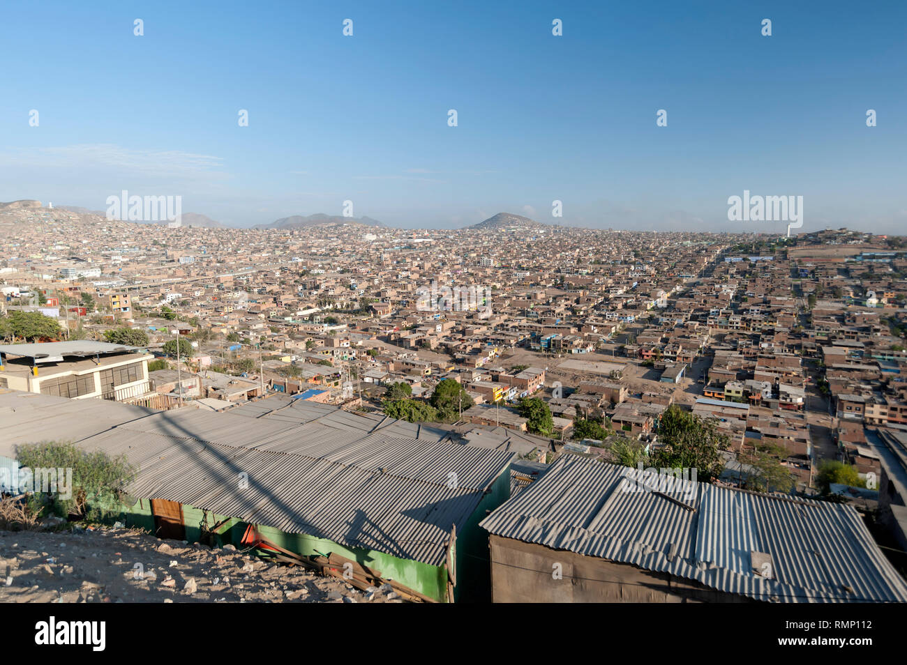 Lima, Perú. View down to district os Villa el Salvador. Stock Photo