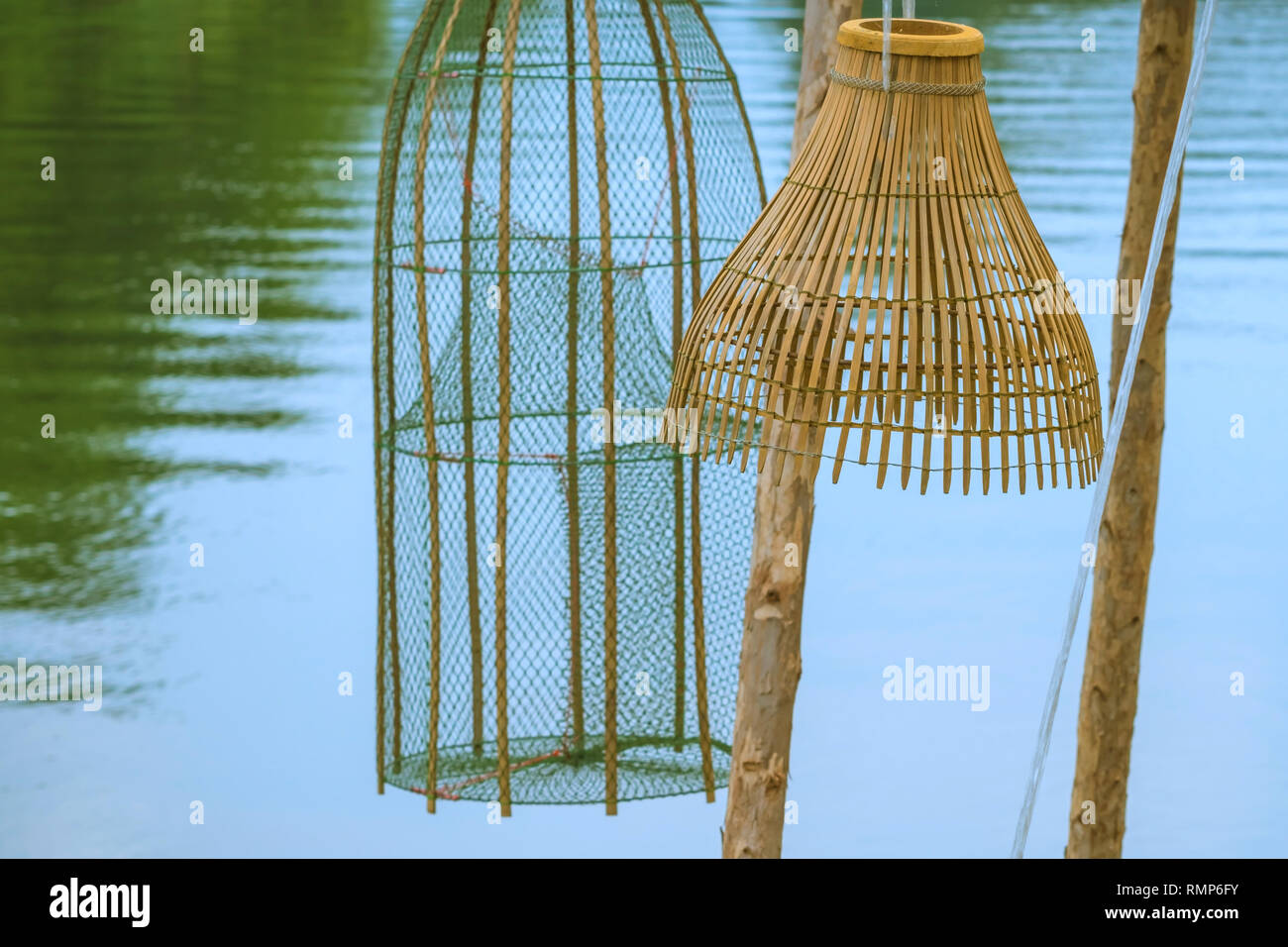 Ancient bamboo fish trap equipment of countryside, Thailand Stock Photo -  Alamy