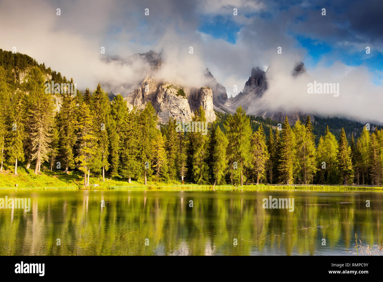 Great view of the foggy Lago Di Antorno in National Park Tre Cime di ...