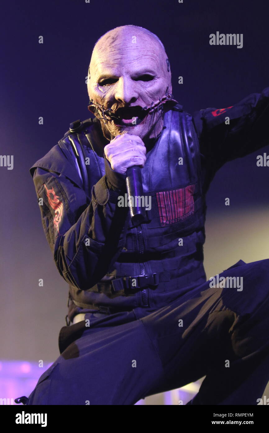 Singer Corey Taylor is shown performing on stage during a 'live' concert appearance with Slipknot. Stock Photo