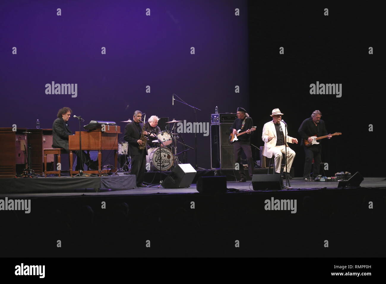 Singer and band leader Lefty Foster is shown performing with the Shaboo All Stars during a 'live' concert appearance. Stock Photo