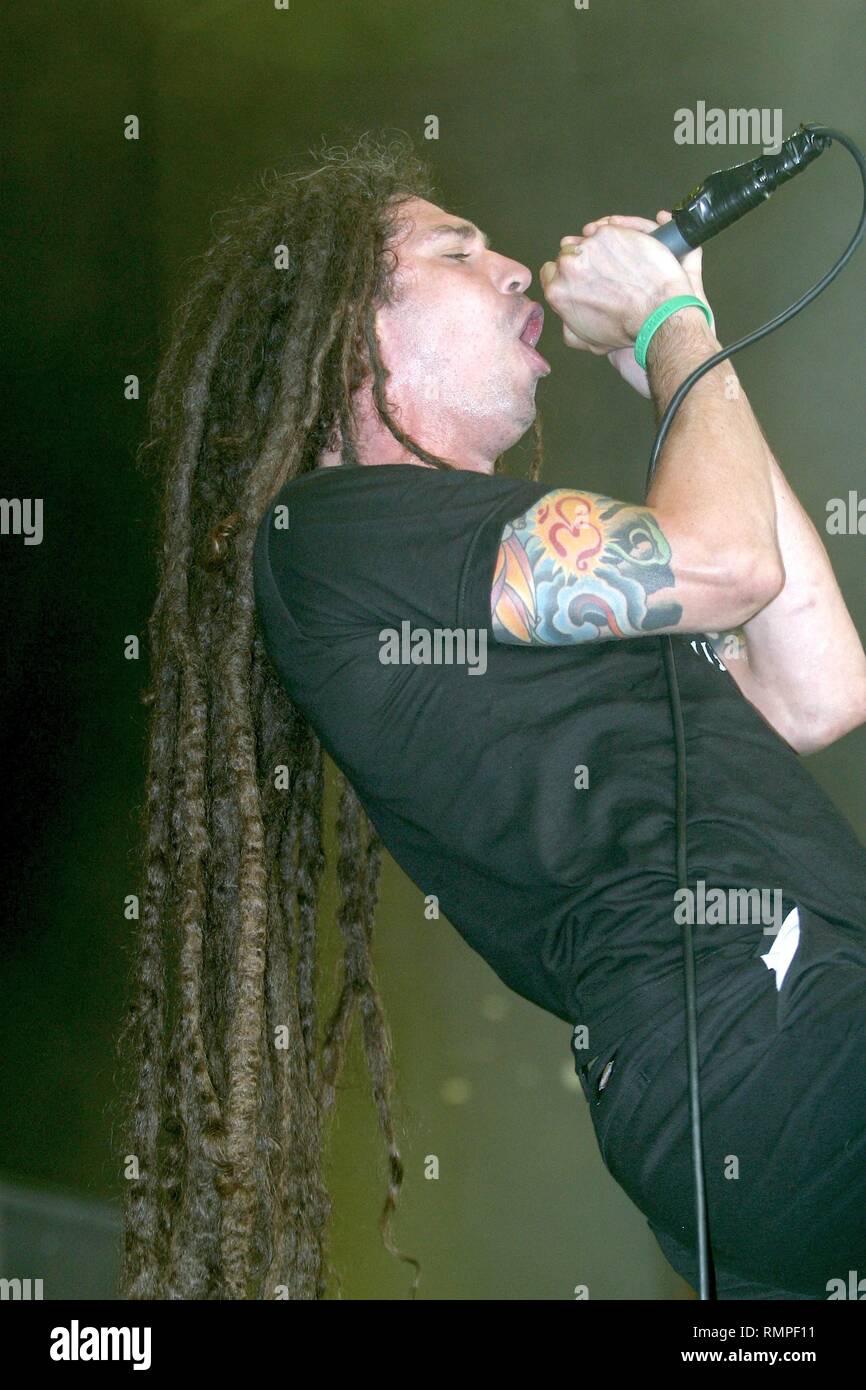 Singer Brian Fair of the heavy metal band Shadows Fall is shown performing on stage during a 'live' concert appearance. Stock Photo