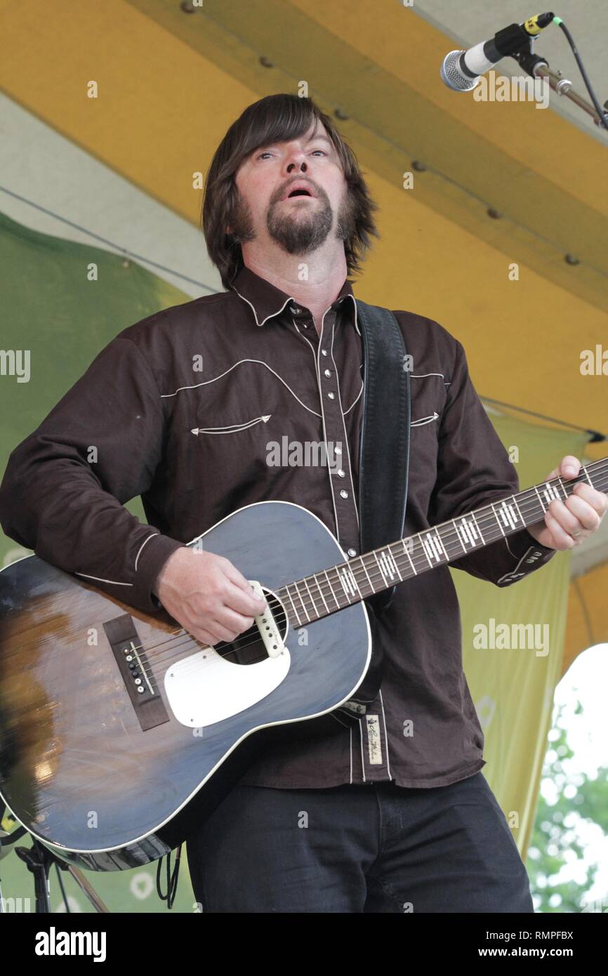 Singer & guitarist Jay Farrar is shown performing on stage during a 'live' concert appearance with Son Volt. Stock Photo