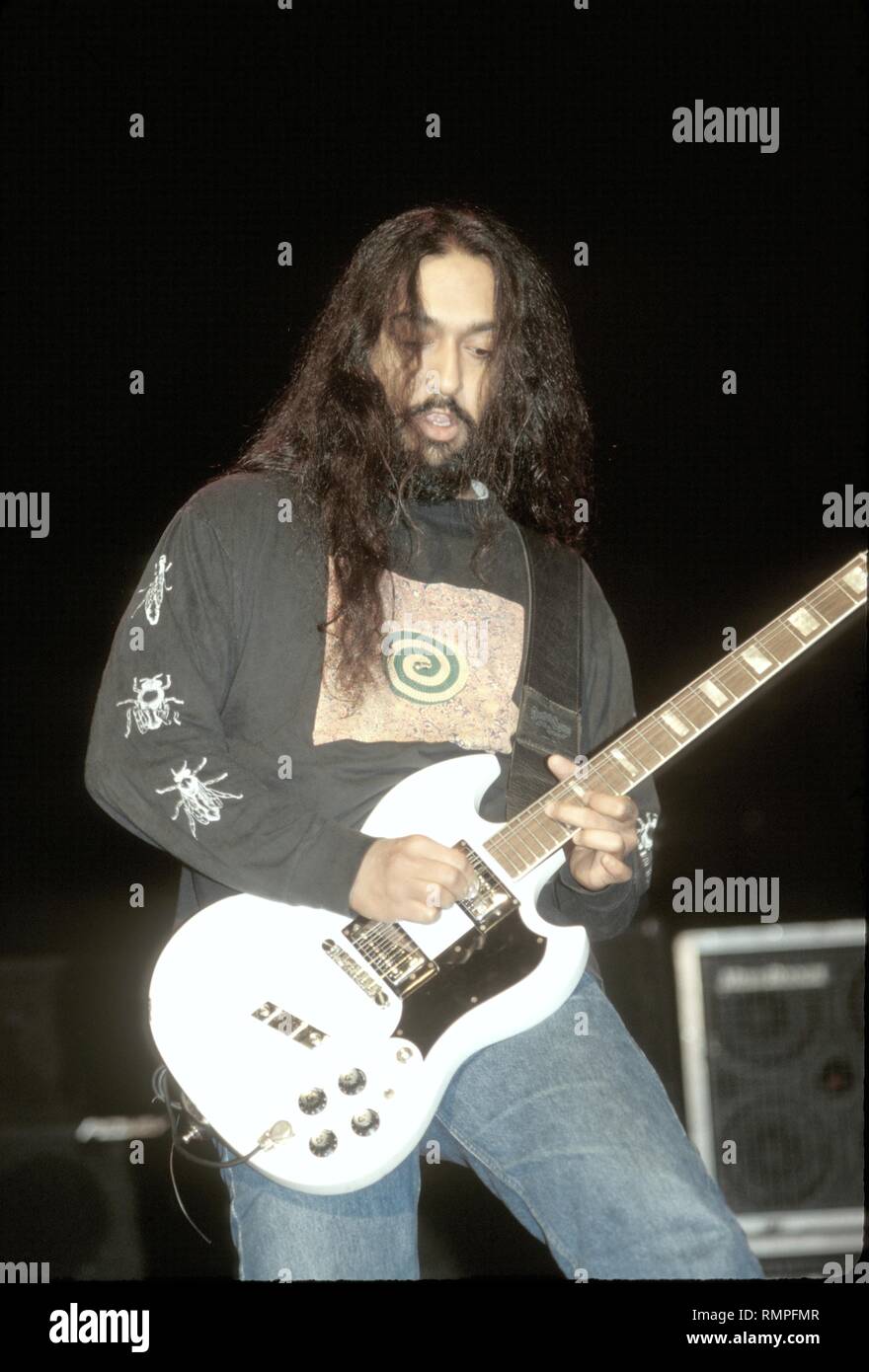 Guitarist Kim Thayil of the rock band Soundgarden is shown performing on stage during a "live" concert appearance. Stock Photo