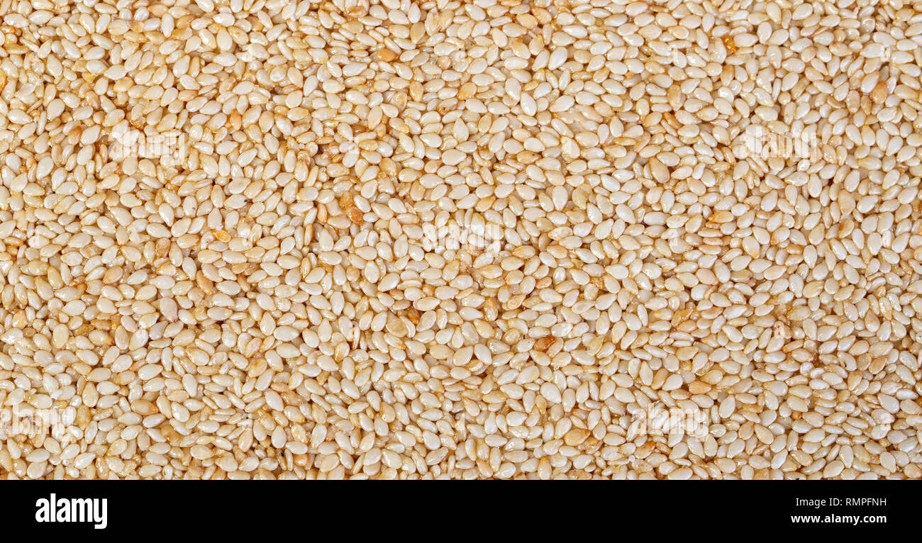 sesame seed honey bar background Stock Photo Alamy