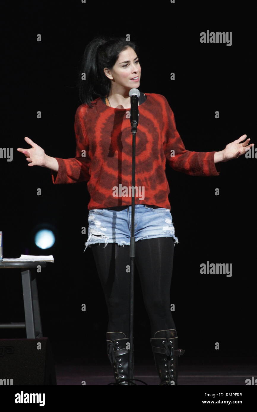 Comedian and writer Sarah Silverman is shown performing on stage during a 'live' stand up appearance. Stock Photo