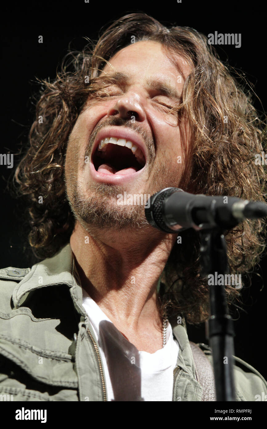 Singer, songwriter and guitarist Chris Cornell of the rock band Soundgarden is shown performing on stage during a 'live' concert appearance. Stock Photo